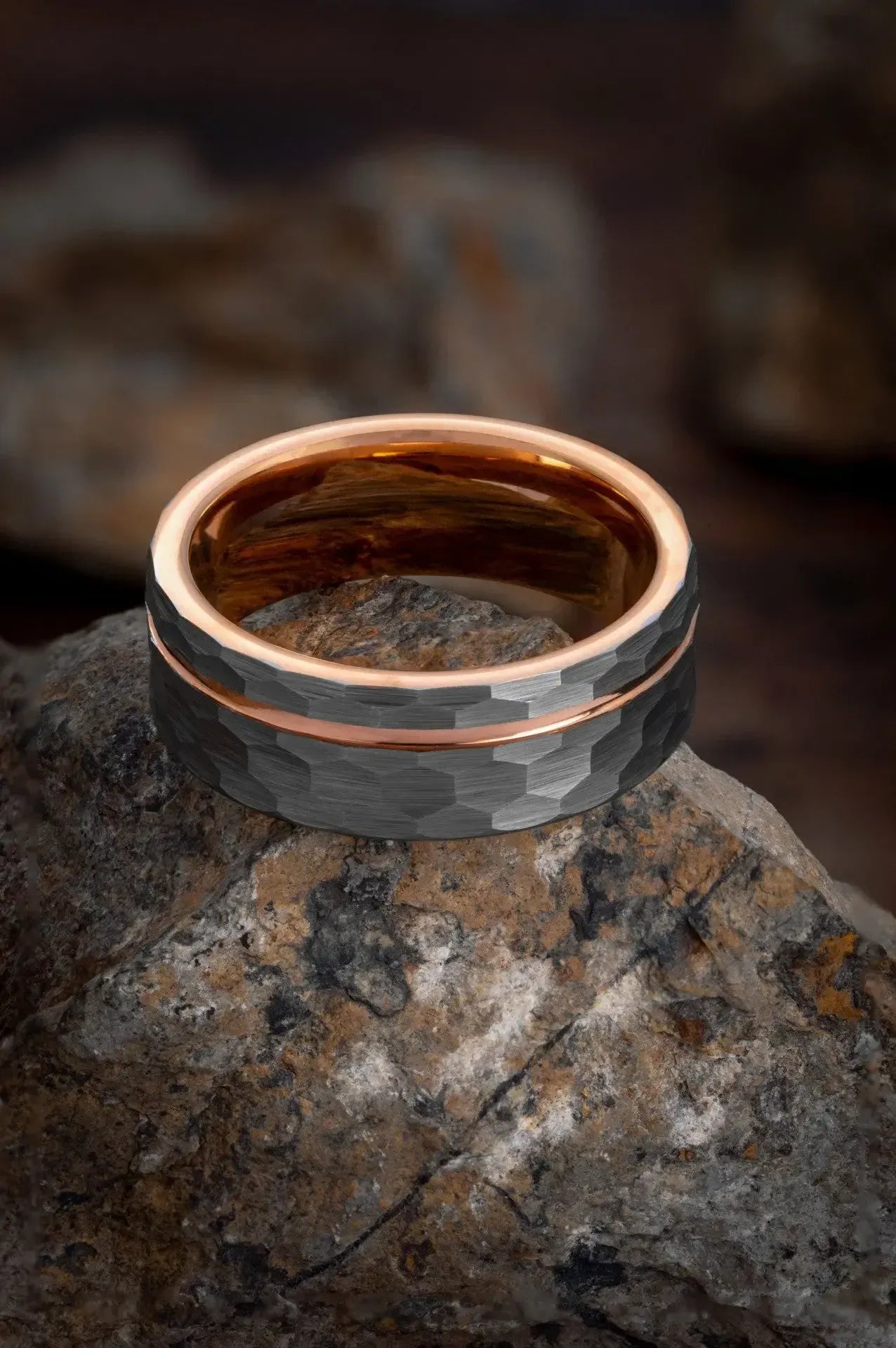 Hammered tungsten ring with gold channel detail from Regalia Rings' The Apollo collection, showcasing a textured finish and elegant design.