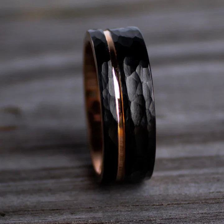 Hammered black Tungsten Carbide pairs with a Rose Gold