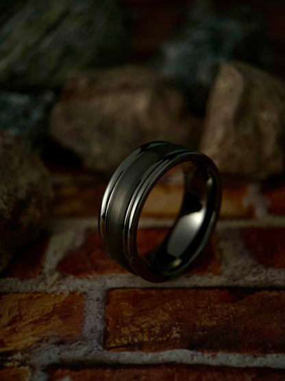 The Deneb classic silver-tone tungsten ring featuring a brushed dome center and polished edges.