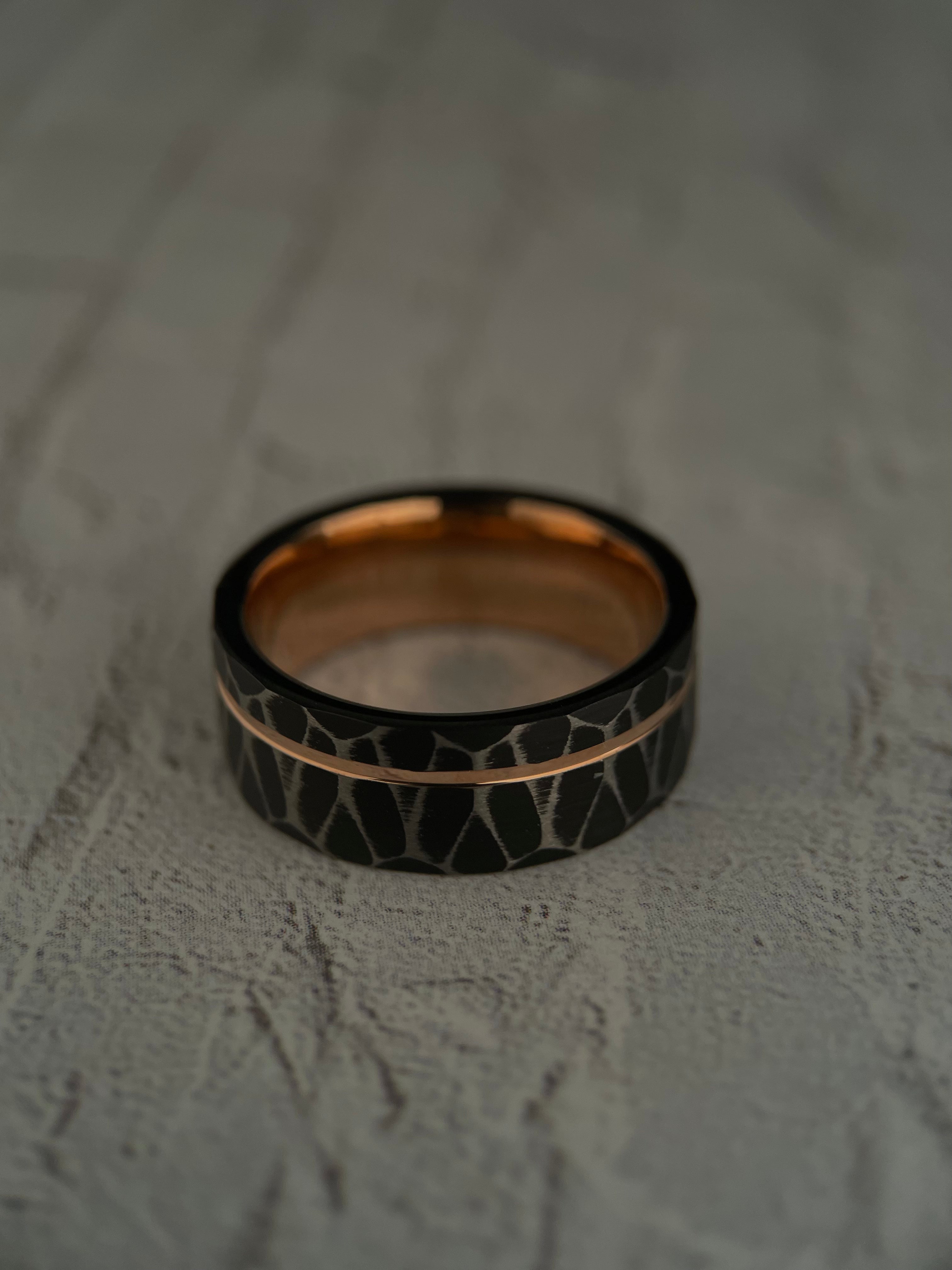 Vega’s Brilliance: Black Tungsten Ring with Rose Gold Accents