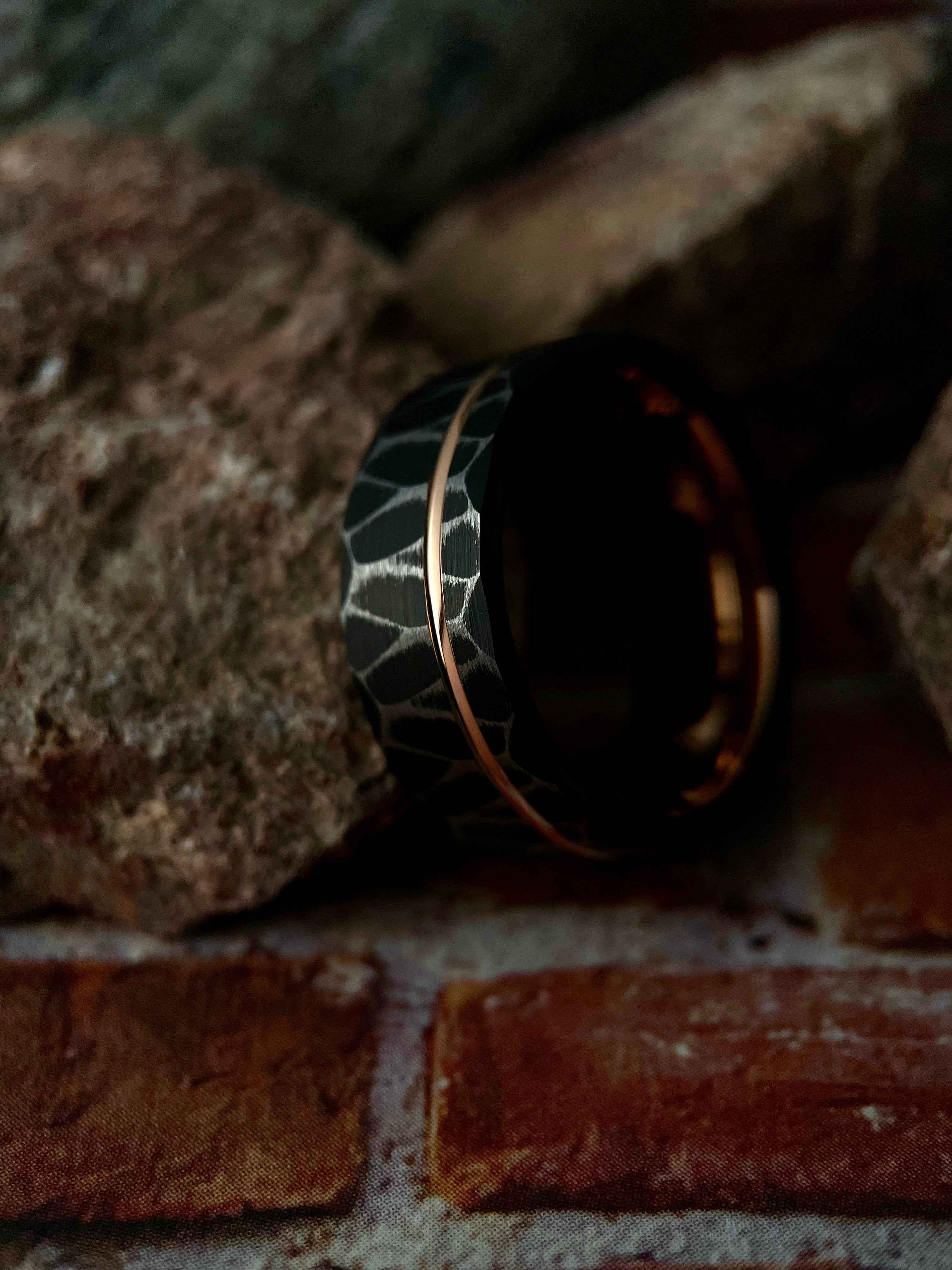 Vega’s Brilliance: Black Tungsten Ring with Rose Gold Accents