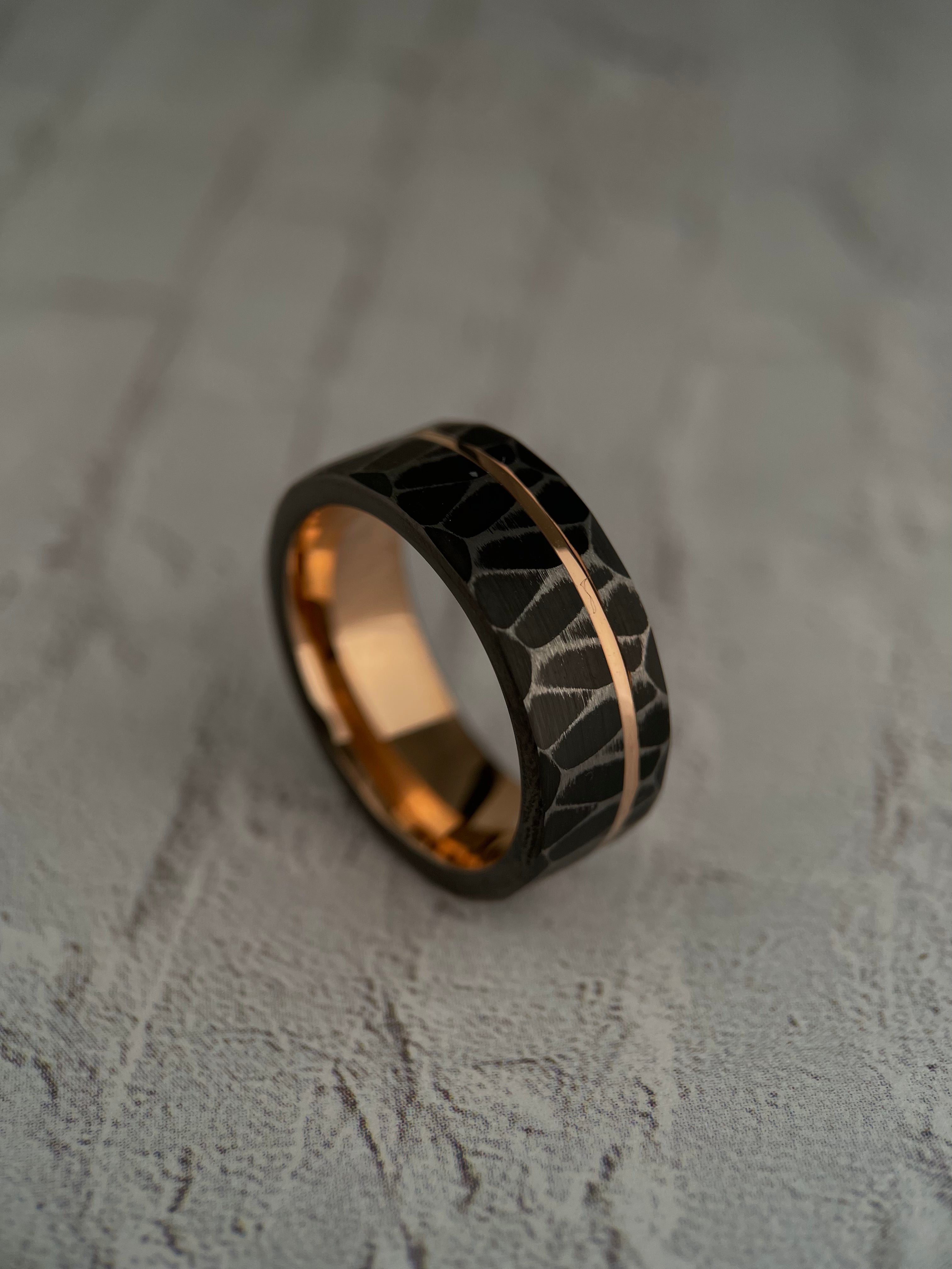 Vega’s Brilliance: Black Tungsten Ring with Rose Gold Accents