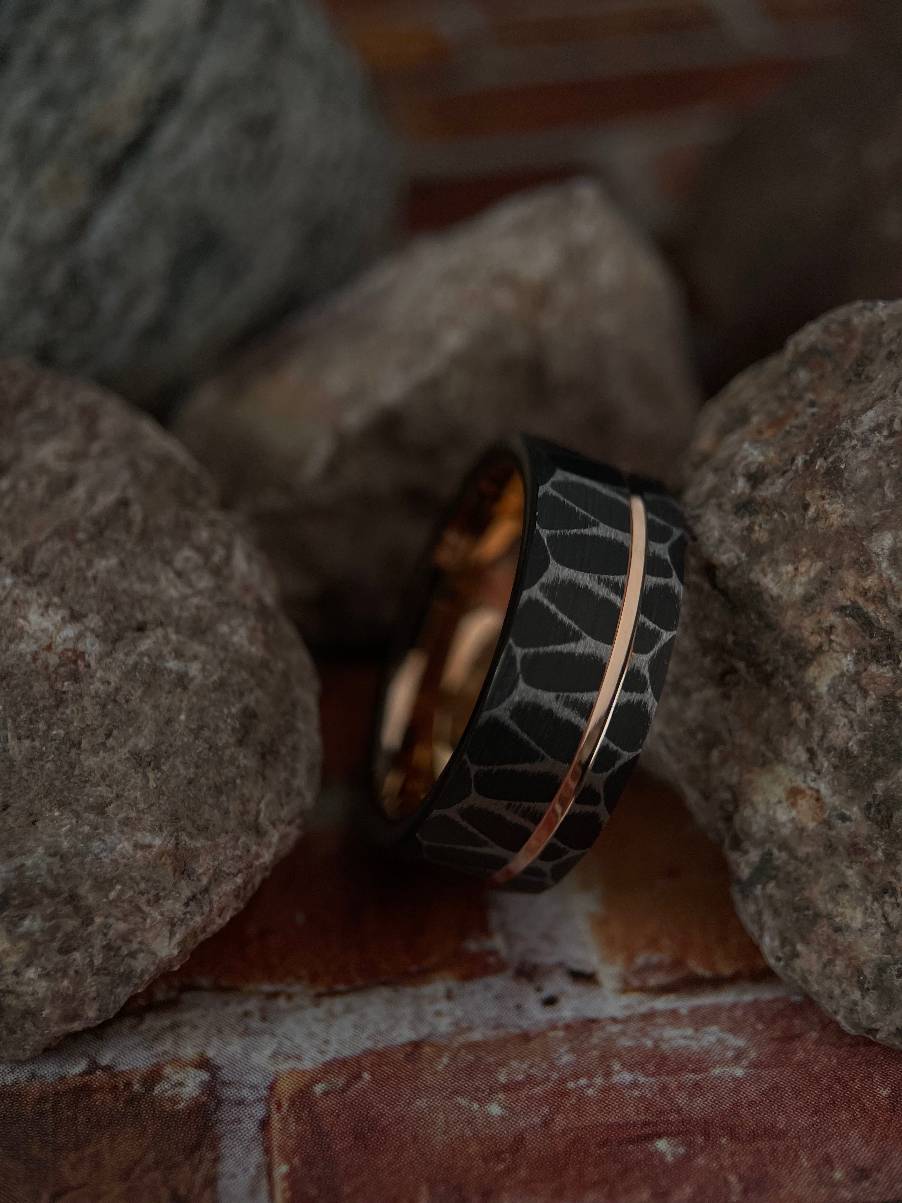Vega’s Brilliance: Black Tungsten Ring with Rose Gold Accents
