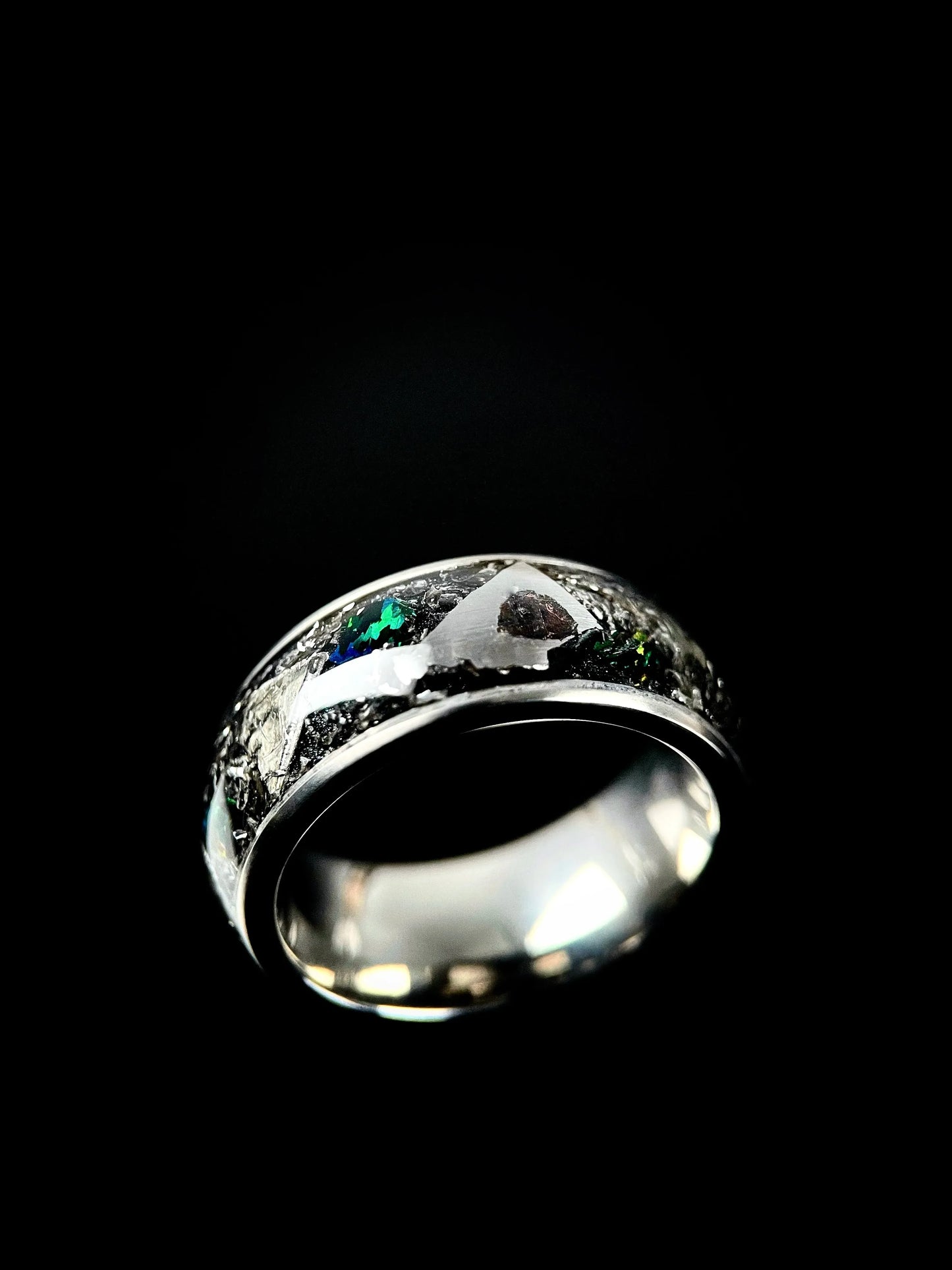 Regalia Rings Boreas titanium ring featuring meteorite inlay and fire opal accents on Grade 5 titanium band.