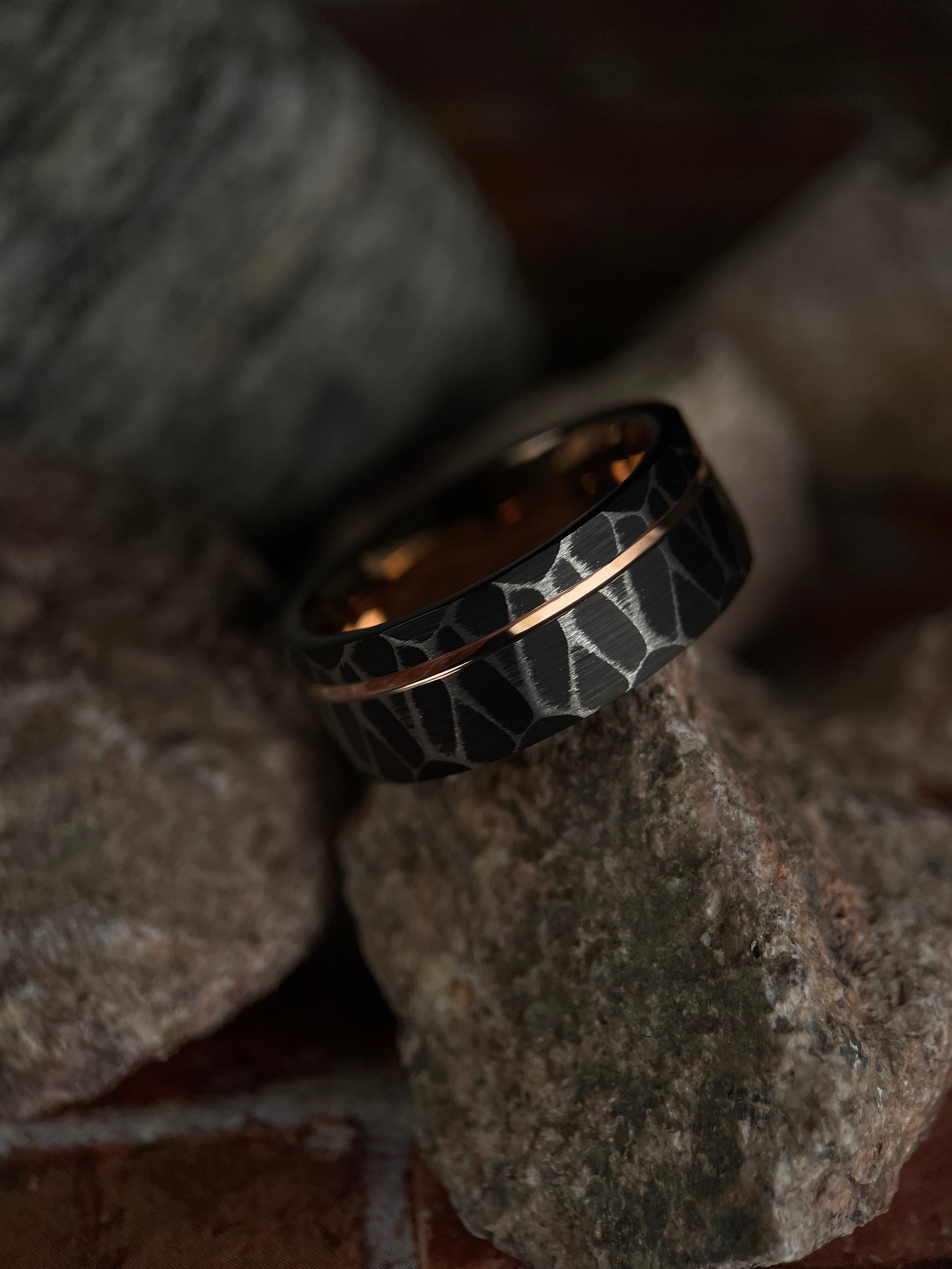 Vega’s Brilliance: Black Tungsten Ring with Rose Gold Accents