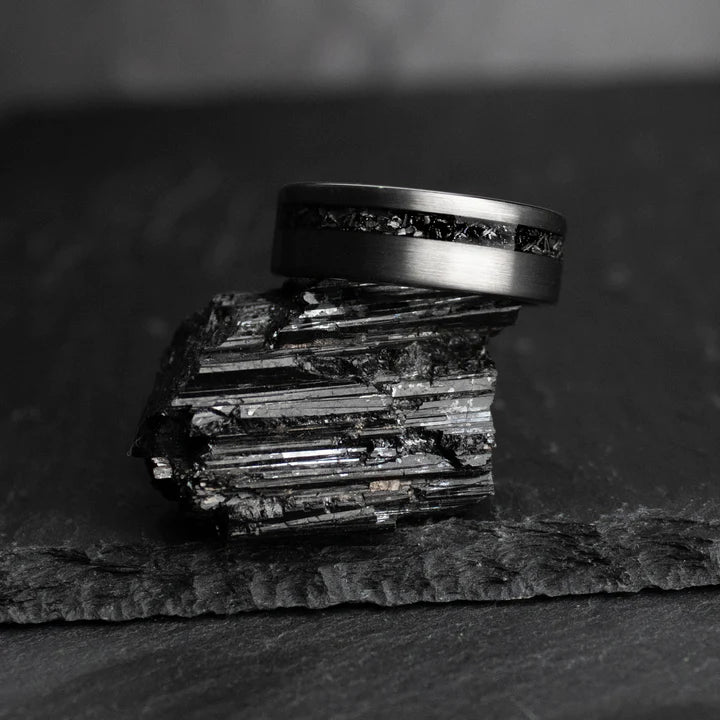 Brushed Tungsten Carbide and meteorite inlay.