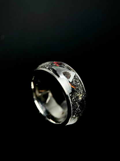 Regalia Rings Boreas titanium wedding ring featuring meteorite inlay and fire opal accents, showcasing a unique, luxurious design.