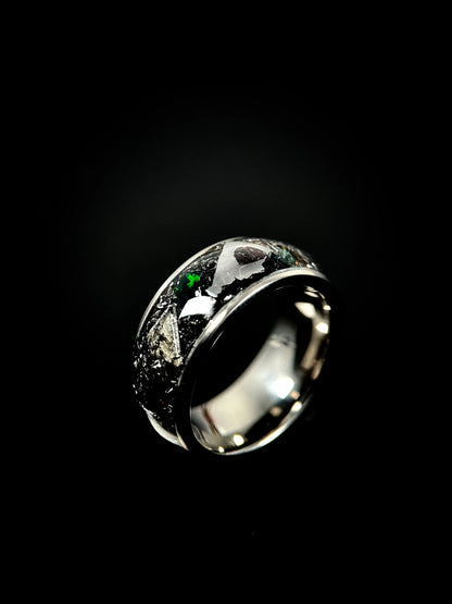 Regalia Rings men's titanium ring featuring a fiery fire opal and meteorite inlay, showcasing a bold and unique jewelry design.