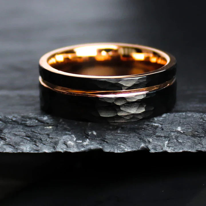 Hammered black Tungsten Carbide pairs with a Rose Gold