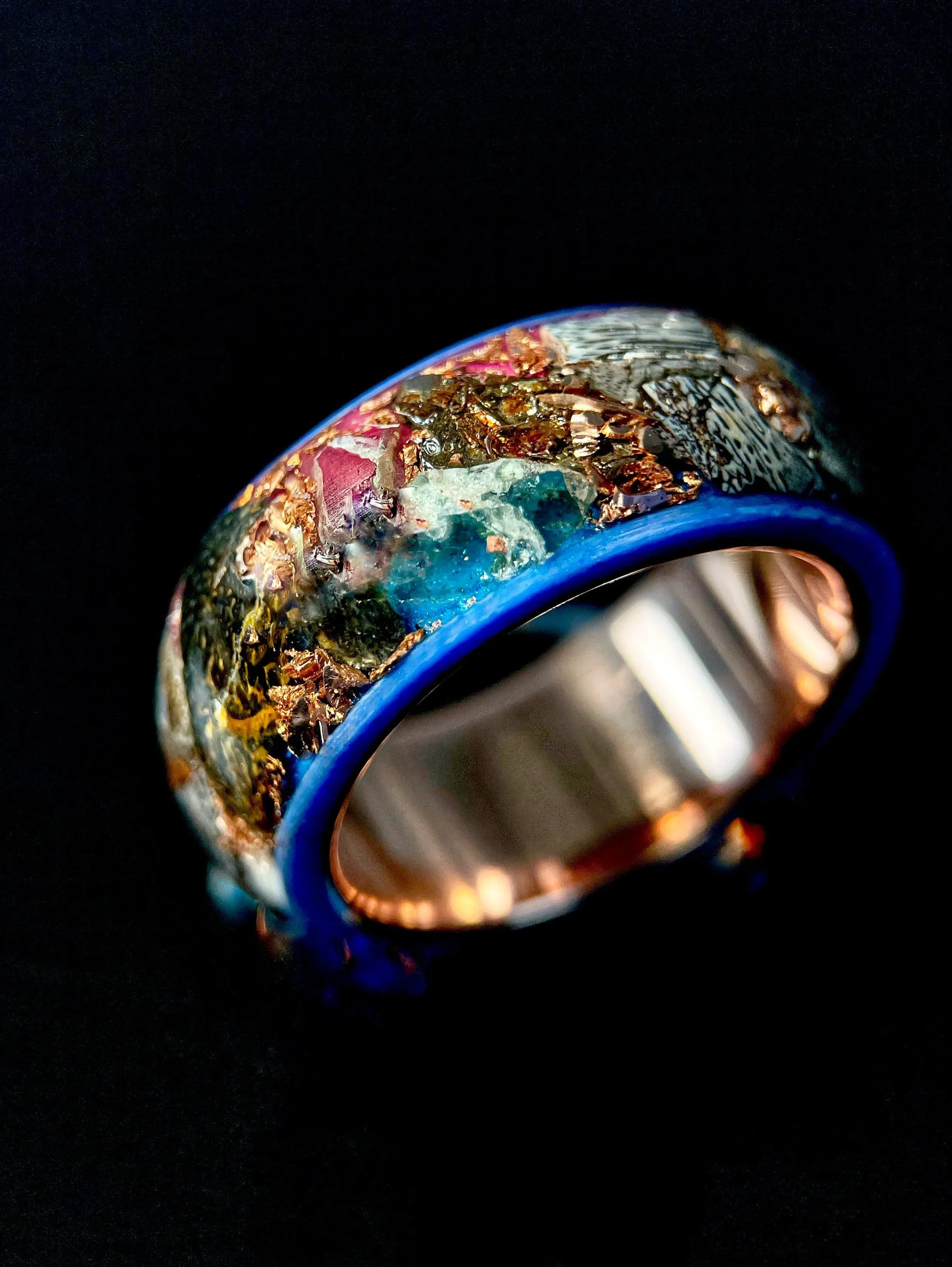 Regalia Rings The Eurus featuring meteorite, dinosaur bone, amethyst, and tellurium copper in a unique handcrafted design.