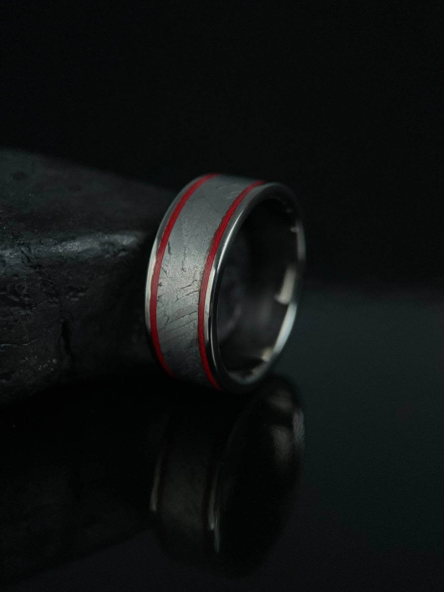 Titanium Grade 5 ring with Muonionalusta meteorite inlaid, stylish jewelry piece from Regalia Rings, showcasing a sleek and modern design.