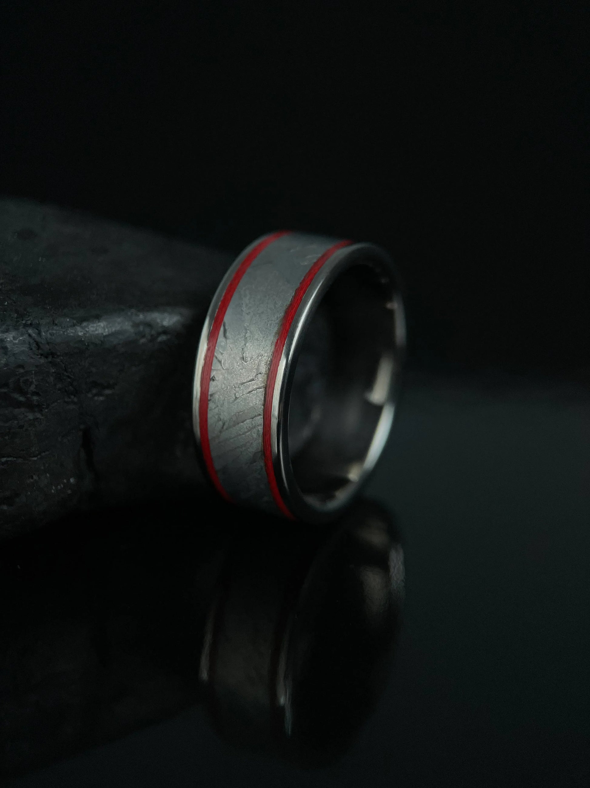Titanium Grade 5 ring with Muonionalusta meteorite inlaid, stylish jewelry piece from Regalia Rings, showcasing a sleek and modern design.