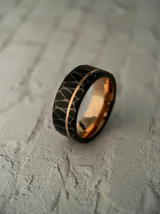 Vega’s Brilliance: Black Tungsten Ring with Rose Gold Accents