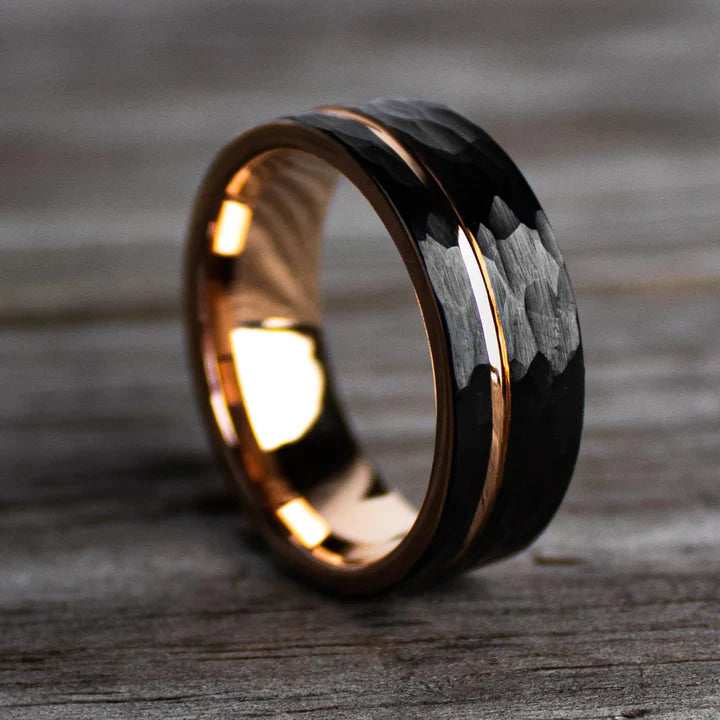 Hammered black Tungsten Carbide pairs with a Rose Gold