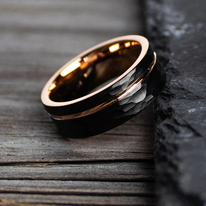 Hammered black Tungsten Carbide pairs with a Rose Gold